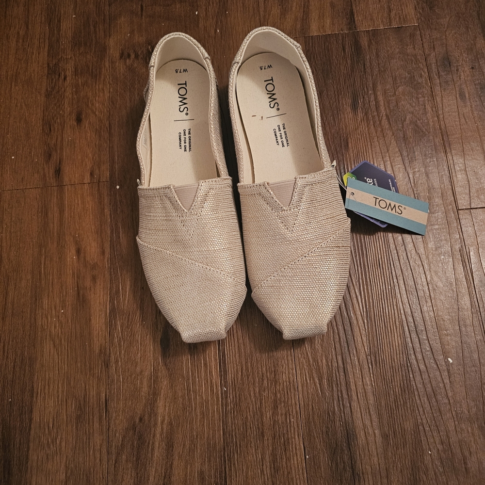 TOMS Women's Gold  Slip-On Shoes
